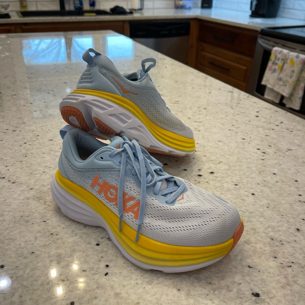 Hoka Bondi 8 tennis shoes.